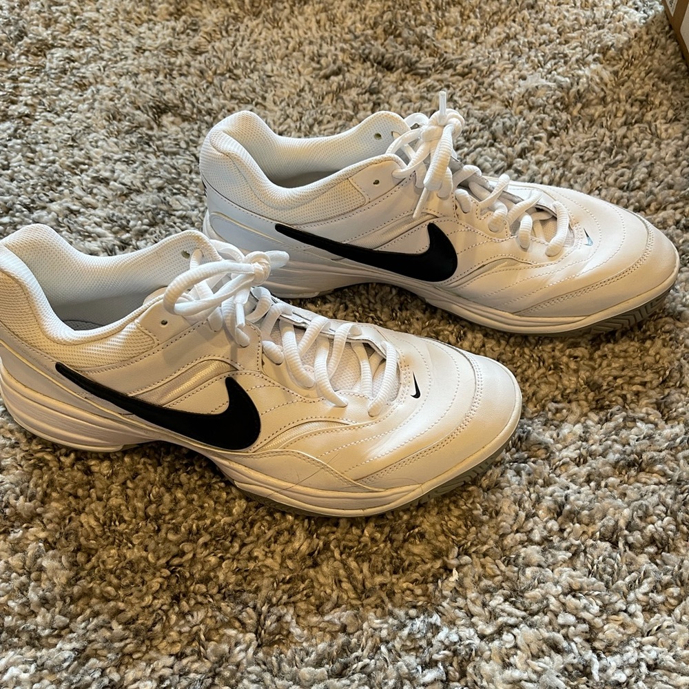 Men’s Nike Tennis Shoes worn a handful of times.